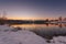 Sunset of idyllic small lake at winter