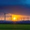 Sunset illuminates sustainable power station renewable energy generated by