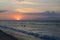 Sunset on the island of Gili Trawangan, northwest of Lombok. View of the island of Bali