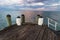 Sunset at the jetty with green and white pillars of Cowes, Phillip Island, Australia