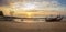 Sunset at Klong Muang Beach, Krabi, Thailand. Long tail boats at low tide