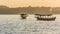 A sunset on Koh Rong island with two boats