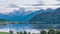 Sunset on Lago della Muta lake with the snowy Mount Ortles in the background, South Tyrol, Italy, reflected in the water