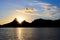 Sunset Lagoon Rodrigo de Freitas (Lagoa), sun behind mountain, R