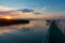 Sunset at Lake Balaton with pier and silhouettes in Hungary