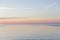 Sunset on Lake Ontario. Yacht is floating on horizon line. Rochester, USA