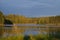 Sunset on the lake. warm light falling on the forest. landscape photography