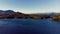 Sunset on lakes of argentinian patagonia bariloche from drone