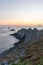 Sunset landscapes at the Raz Point Pointe du Raz with cliffs into the sea, Brittany, France