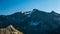 Sunset light over retiring dying glaciers on the Italian French Alps. Climate change concept.