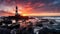 Sunset Lighthouse Reflection On Waves And Rocks