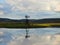 Sunset lights up a geothermal farm pond in FingerLakes