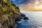 Sunset at Ligurian coastline near Riomaggiore town in Cinque Terre National park, Italy