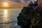 Sunset at Ligurian coastline near Riomaggiore town in Cinque Terre National park, Italy