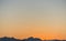 Sunset line over mountains