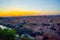 Sunset at lookout of Toledo, Spain. Tajo river around the city and Alcazar and Cathedral at background.