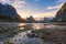 Sunset during low tide at Milford Sound, Southland, New Zealand`s South Island.