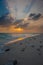 Sunset in the Maldives. Beautiful colorful sunset over the ocean in the Maldives seen from the beach.Amazing sunset and beach