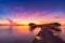 Sunset on Maldives island, luxury water villas resort and wooden pier. Beautiful sky and clouds and beach background for summer va