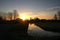 Sunset meadows at the lowest polder in the Netherlands Zuidplaspolder between Gouda and Rotterdam