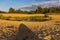 Sunset at the Mechelse Heide ith a scenic view of being on the beach with sand and water and hard shadows of rocks