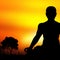 Sunset meditation silhouette vector background