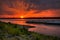 Sunset on the Mississippi River Barges Traveling the waterway