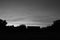 sunset misty black and white flowing clouds horizontal with large footer text area