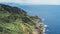 Sunset in mountain natura perspective landscape. Green valley island on background blue sky, clouds, sea ocean. Panorama horizon