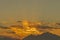 Sunset mountain peaks sky. Mountain peaks sunset view. Sunset mountain peaks silhouette. Mountain sunset sky clouds