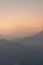 Sunset in the mountains. Mountain view in the fog