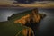 Sunset at Neist Point, famous cliff head with lighthouse on Isle of Skye, Scotland,UK