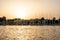 Sunset Nile Aswan the West Bank with small village houses with fishing sailing boats felucca