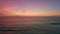 Sunset at ocean bay waves aerial view nature seascape Sunset light Dramatic dark clouds in sunset sky drone shot high angle view
