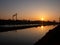 Sunset on the Odra`s river Wroclaw.View to smoking Chimneys