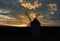 Sunset of old spanish windmills on a sunny day with clouds, backlight photography