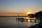 Sunset with olive trees on the Bardolino lake promenade