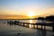 Sunset with olive trees on the Bardolino lake promenade