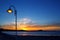 Sunset orange blue seascape light lamppost