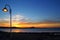 Sunset orange blue seascape light lamppost