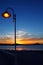 Sunset orange blue seascape light lamppost