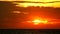 Sunset orange red sky and dark red cloud moving on sea time lapse