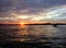 Sunset from the outrigger approaching Lucap Port after Hundreed Islands National Park boat tour, Alaminos, Philippinnes