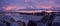 Sunset over beach with pink colours. Panorama