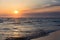 Sunset over beach sea tide sand coast seashore