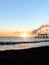 Sunset over blacksand beach near Waimea