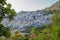 Sunset over the blue Moroccan town of Chefchaouen, as seen from the hill of the Spanish Mosque.