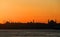 Sunset over the Bosporus. The plane takes off over the silhouettes of the Blue Mosque.