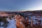 Sunset over canyon slopes covered in snow, Bryce Canyon National