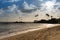 Sunset over catamaran and beach in Kahala, Hawaii